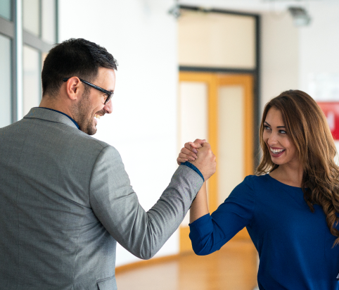 young successful business people greeting company s office